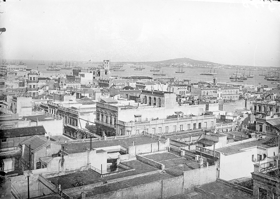 An 1892 view of the old city of Montevideo with the Cerro hill (mountain) in the background.