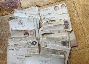 Bundles of letters tied together, as they were kept in the garage of Amelie's home in Cambridge
