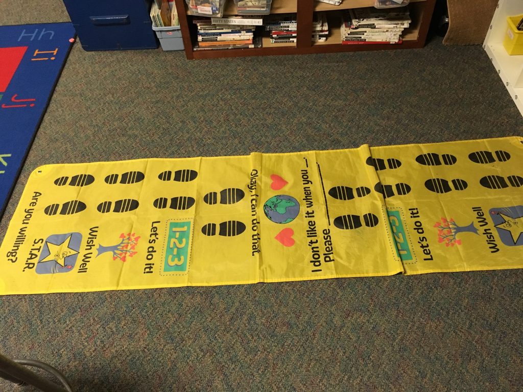 Problem-solving mat on classoom floor