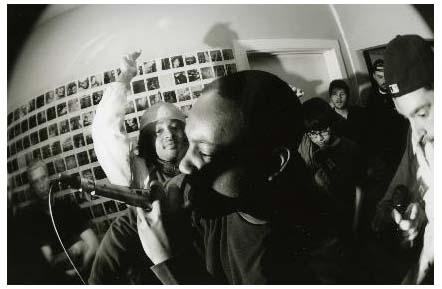 Image of Harrison performing as a participant-observing member of the Forest Fires Collective (the hip hop group he founded during his fieldwork.