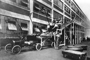 Image of Model-T coming off the assembly line.