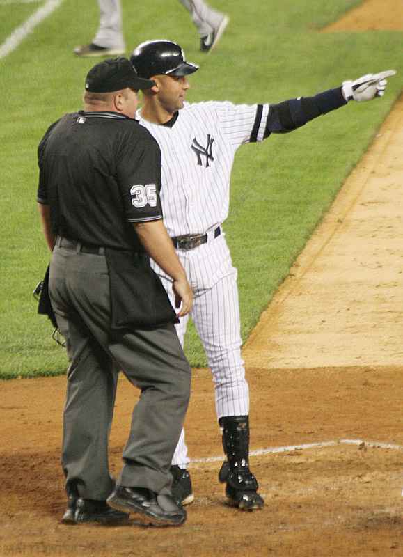New York Yankees shortstop Derek Jeter talks with the home plate umpire after his inning-ending strikeout during the Yankees game against the Arizona Diamondbacks on June 12th at Yankee Stadium.