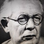 Piaget wearing glasses