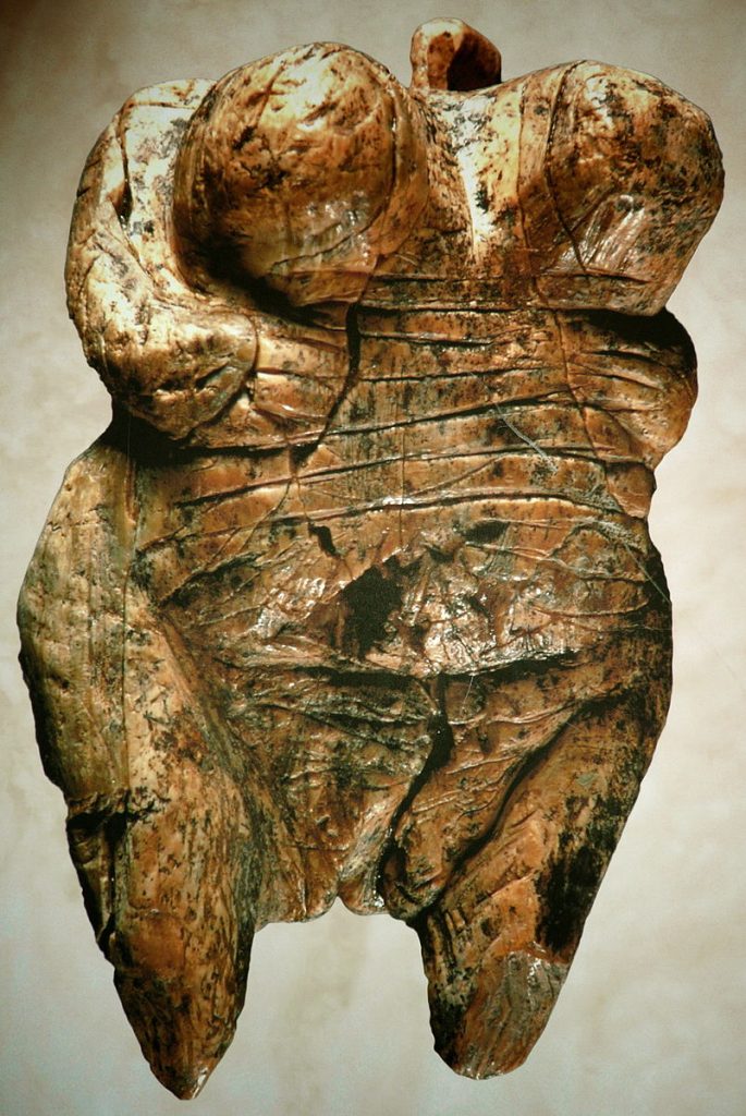 Paleolithic figurine of a nude woman, carved from mammoth ivory